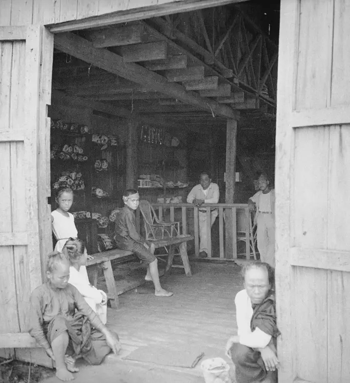 September 11, 1933. Dulauan [Datu Piang], Cotabato Prov. [Maguindanao province] Ugulingan, the son of Piang's croodile skin shop. f.3.8 1/10.