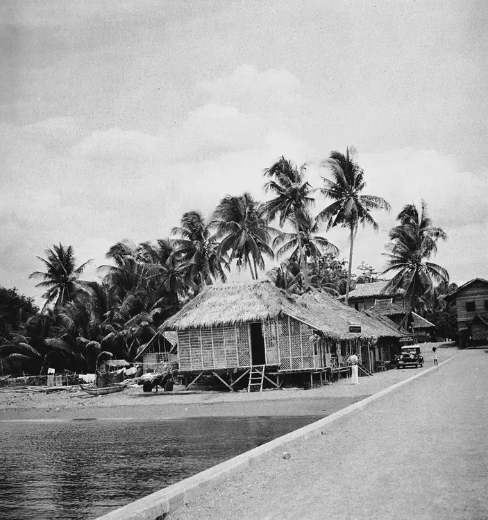 (Toledo, Cebu 1933). September 18, 1933. Toledo - Aloguinsan Road, Cebu-Toledo Road, Cebu Province. Wharf and restaurants, Toledo.