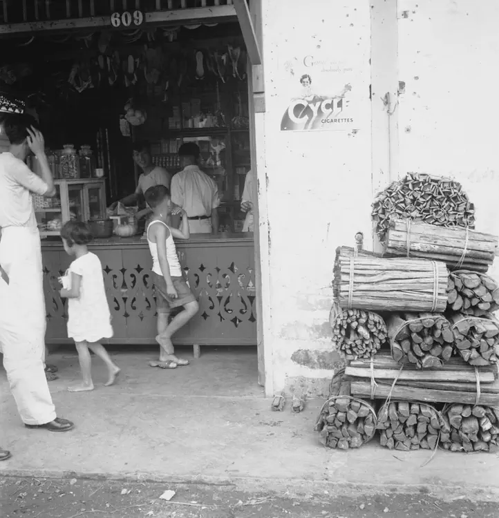 Pasay, Manila, 1935. 'Jan. 12, 17, 1935. Wood in Pasay shop. Big bundles - Big Sticks 20 c. - small sticks 18. Tiny bundles, above, 1/2 cent.'