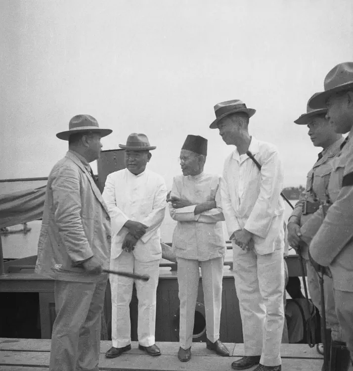 Cotabato City, Cotabato, 1933. 'August 31, 1933. Cotabato. Governor at his launch. Datu Sinsuat, Mr. Marques, etc. f.8 1/50'.